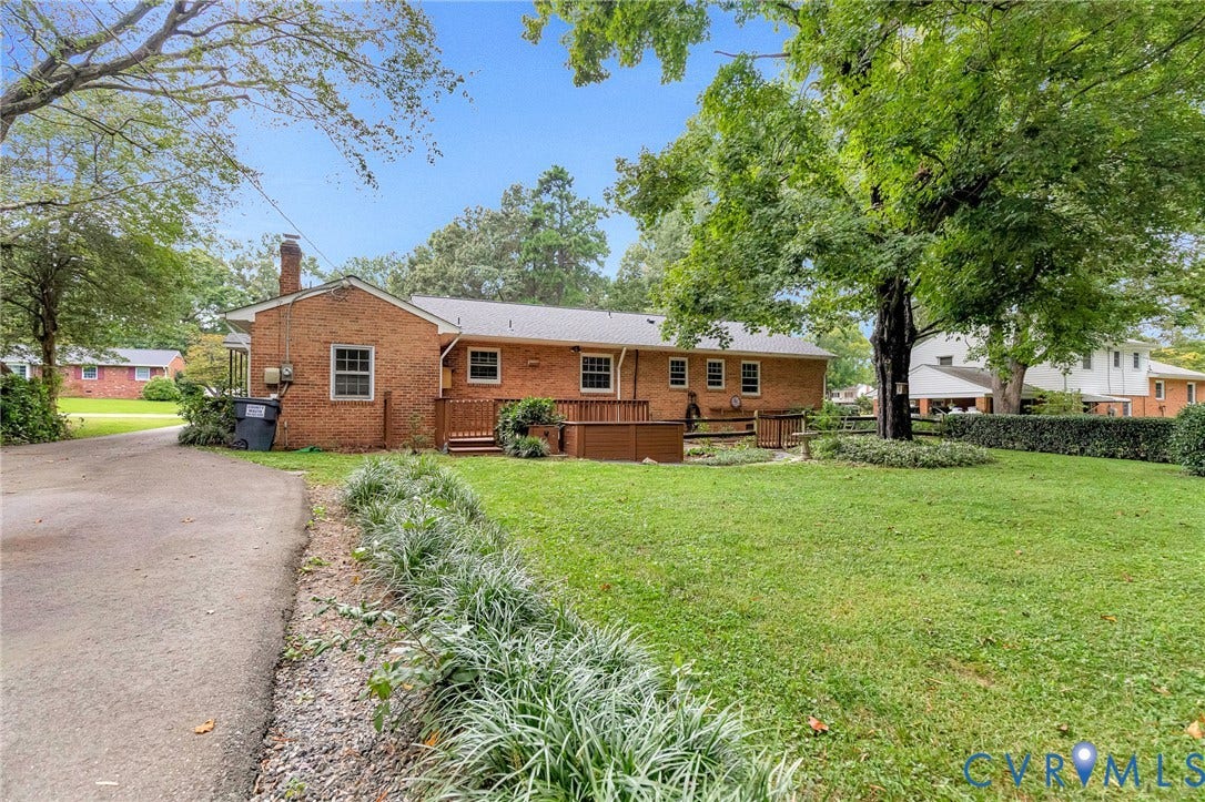 5215 Sprucewood Avenue, North Chesterfield, VA 23234 Brick exterior construction with a wood deck