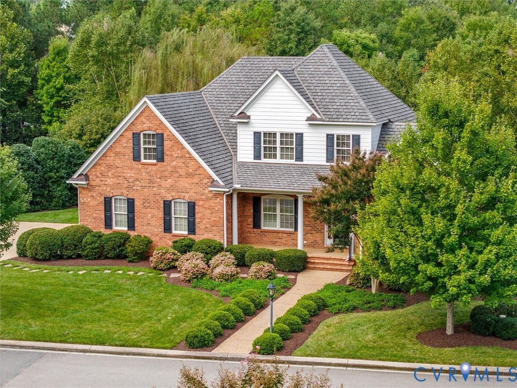 Brick and siding exterior with a gabled roof