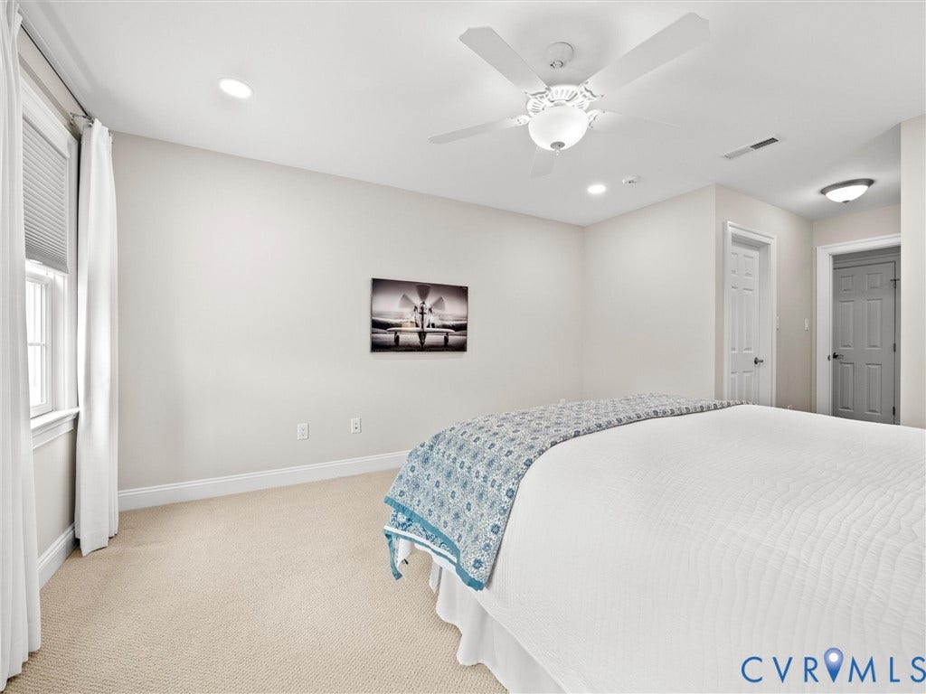 Carpeted flooring, recessed lighting, and a ceiling fan with integrated light fixture