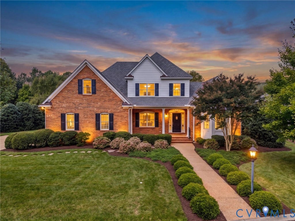 Brick and siding exterior with a gabled roof