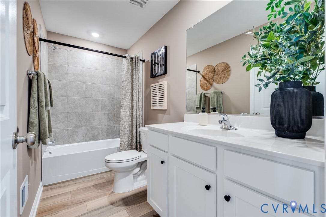 8708 Pullman Lane, Chesterfield, VA 23832 White vanity with a white countertop and integrated sink