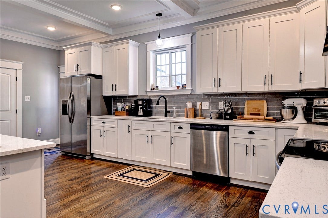 Kitchen opens to Opens to Laundry room and pet door