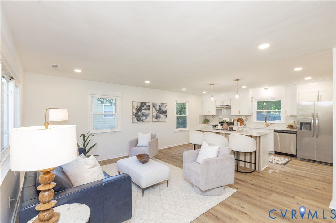 6015 Seaman Road, Westover, Richmond, VA 23225 Open-concept living space featuring wood-finish flooring, recessed lighting, and white walls
