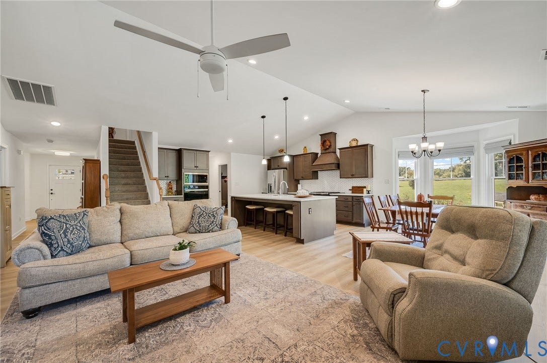 11804 Rydal Way, Cobbs Creek, Glen Allen, VA 23059 Vaulted ceilings with a ceiling fan, recessed lighting, wood-finish flooring, and a kitchen island with pendant lighting
