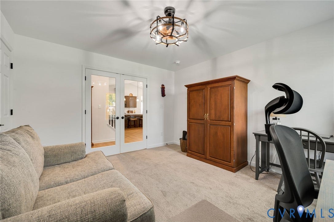 11804 Rydal Way, Cobbs Creek, Glen Allen, VA 23059 White walls with neutral carpeting, paired with an industrial-style ceiling fixture