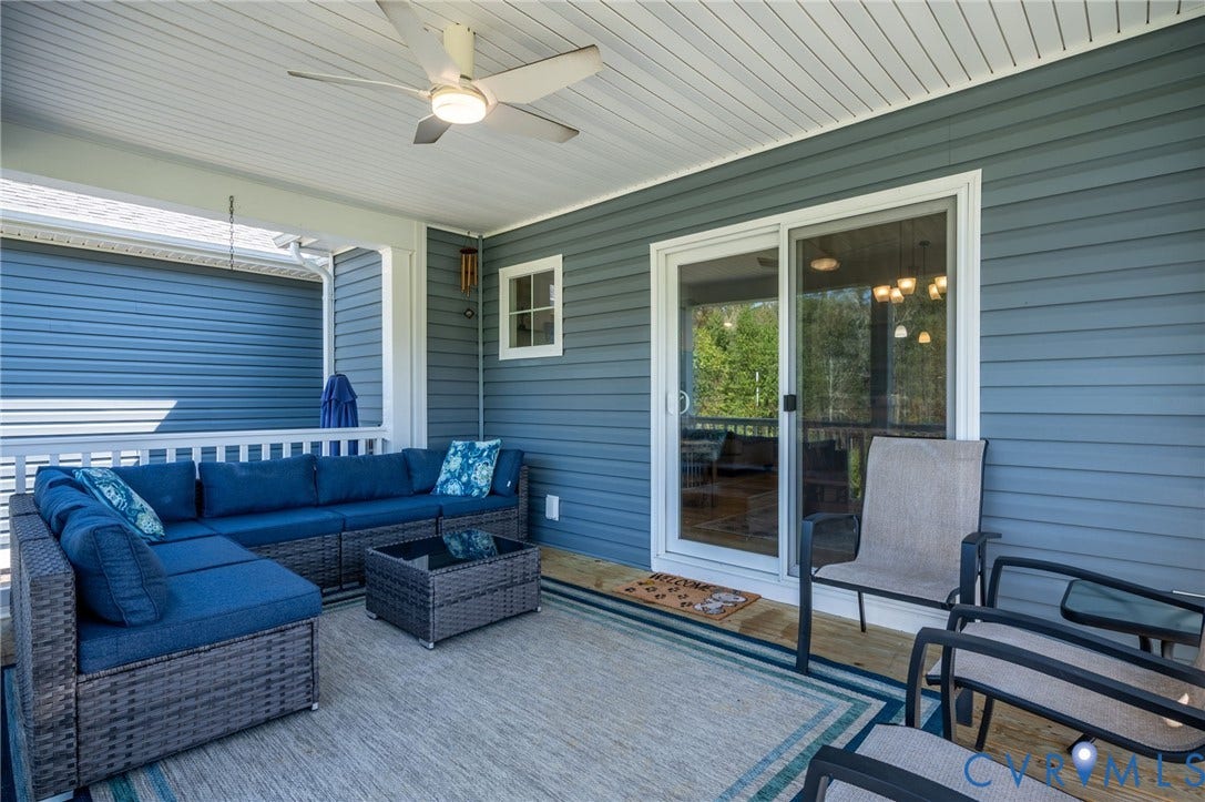 11804 Rydal Way, Cobbs Creek, Glen Allen, VA 23059 Covered patio featuring a ceiling fan with integrated lighting, wood-finish flooring, and white railings
