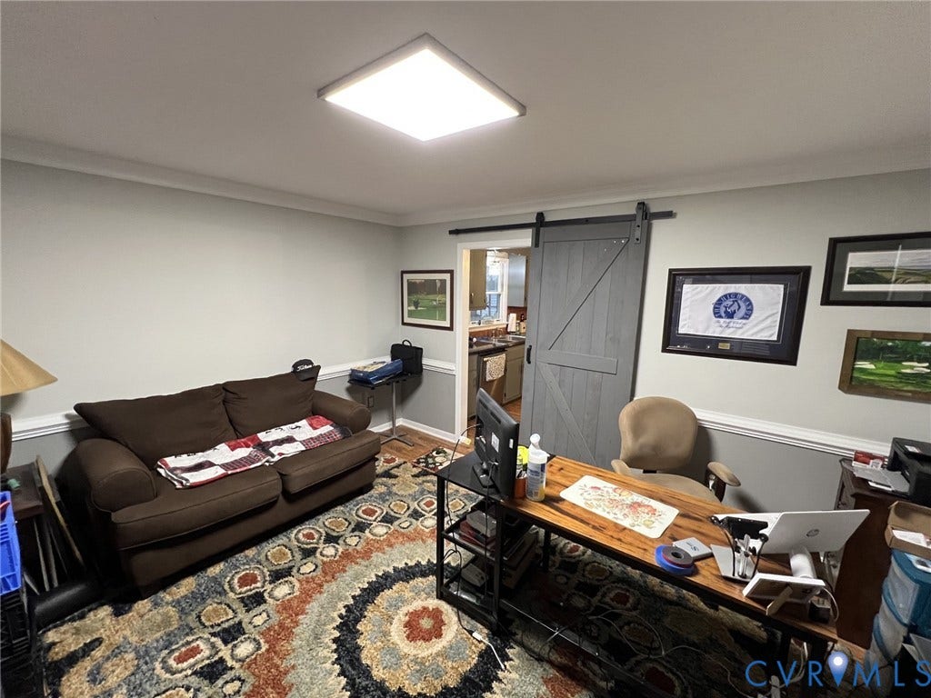 8336 Devils Den Lane, Mechanicsville, VA 23111 Recessed ceiling lighting, crown molding, chair rail molding, and a gray barn door