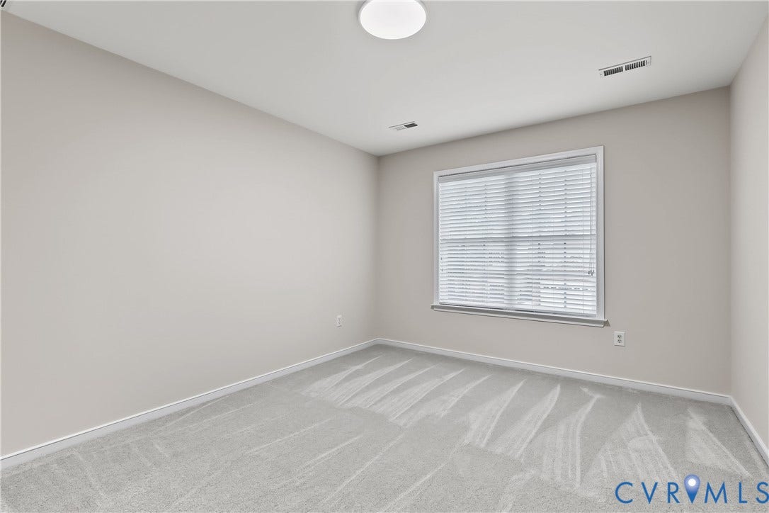 2nd Floor Bedroom 3 Featuring Carpet.