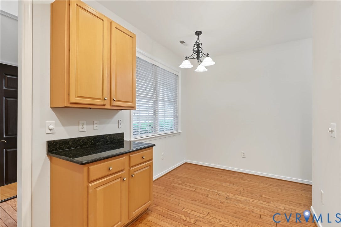 Eat-In Kitchen Featuring Engineered HW floors.