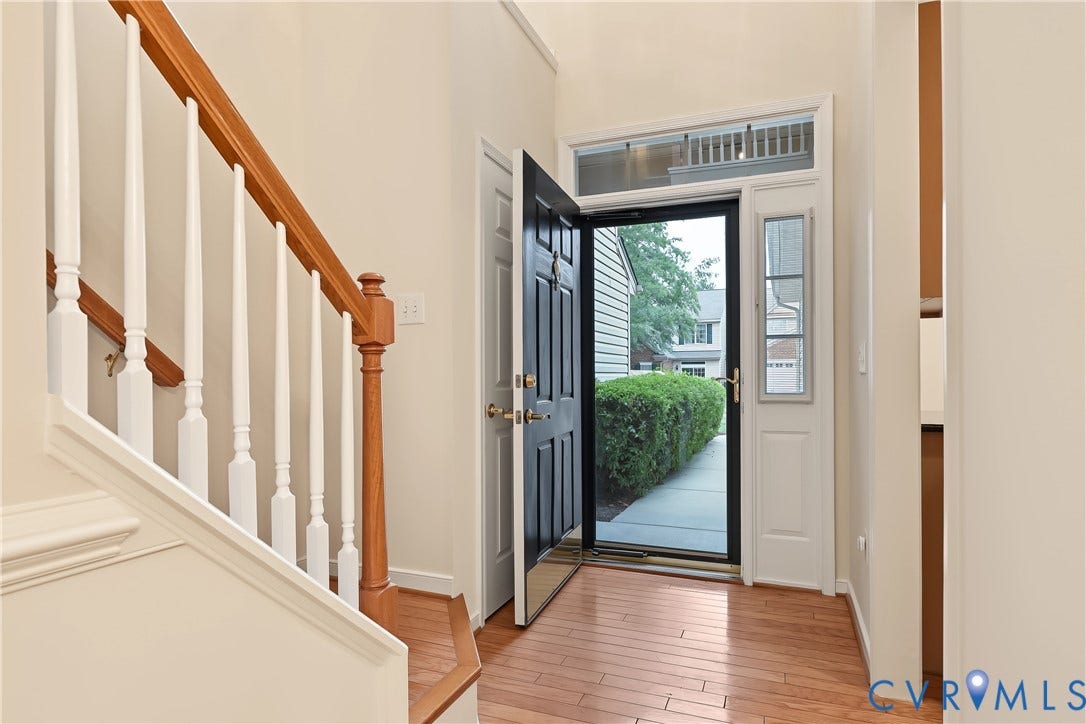 Foyer Entry Featuring Engineered Hardwood Floors.