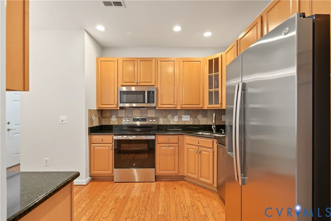 Kitchen Featuring Recessed Lighting.