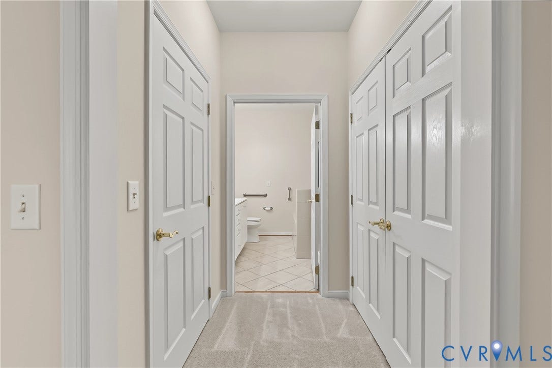 First Floor Primary Bedroom Walk-In Closets.