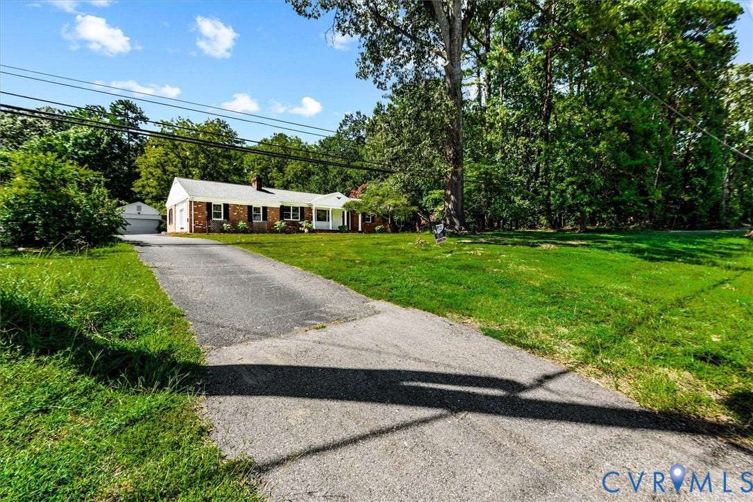 13012 Harrowgate Road, Chesterfield, VA 23831 Brick exterior with white siding accents and a contrasting roof