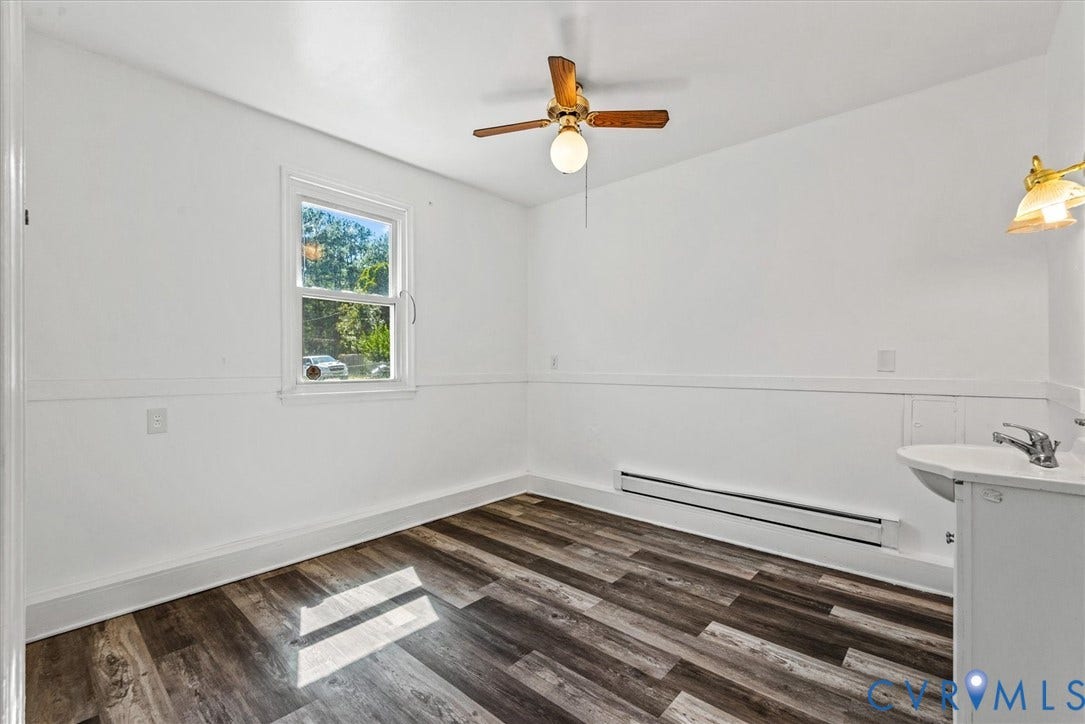 13012 Harrowgate Road, Chesterfield, VA 23831 Wood-finish flooring with white walls and trim
