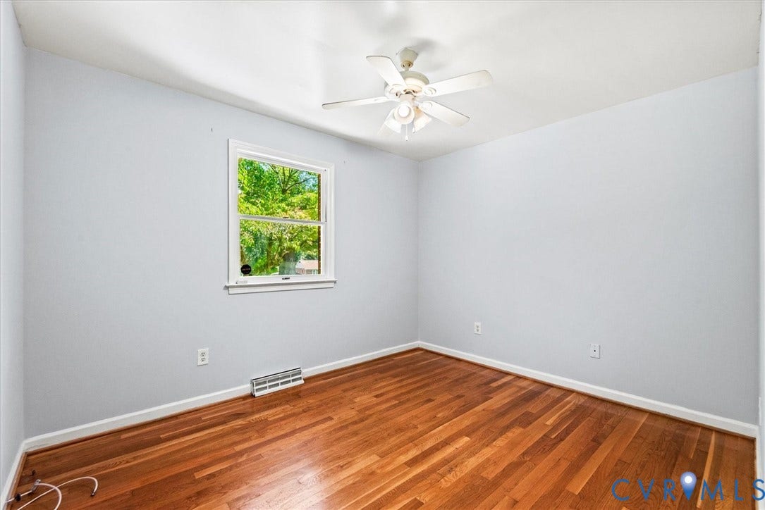 13012 Harrowgate Road, Chesterfield, VA 23831 Hardwood flooring, painted walls, white trim, and a ceiling fan with integrated lighting