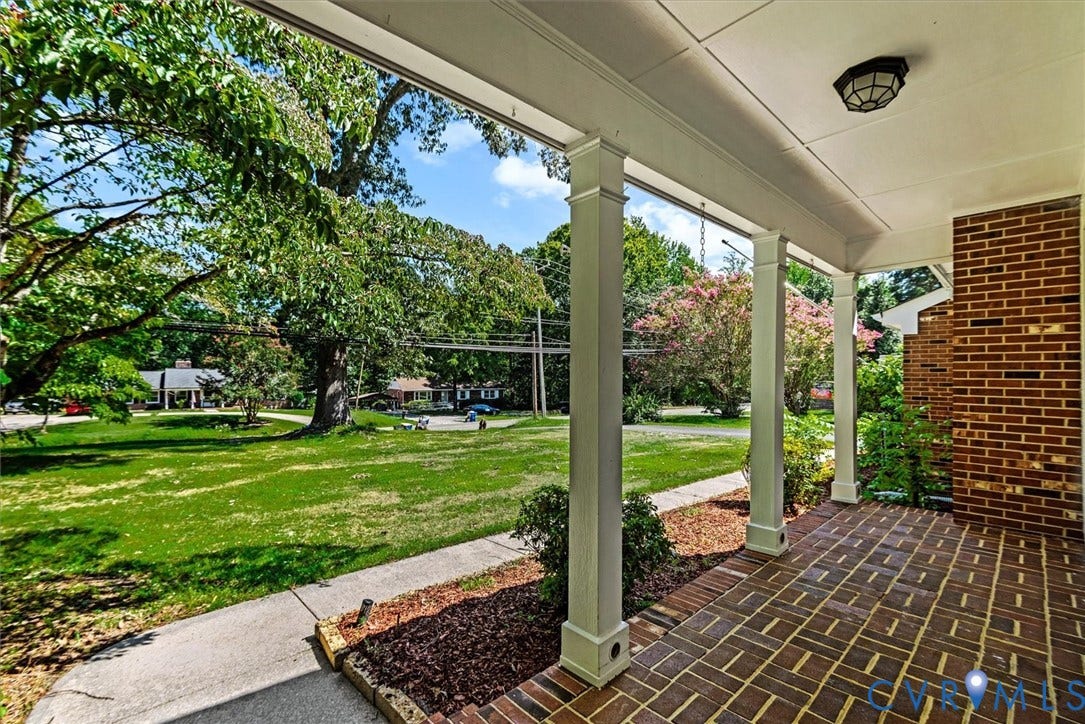 13012 Harrowgate Road, Chesterfield, VA 23831 Covered front porch featuring brick flooring and white columns
