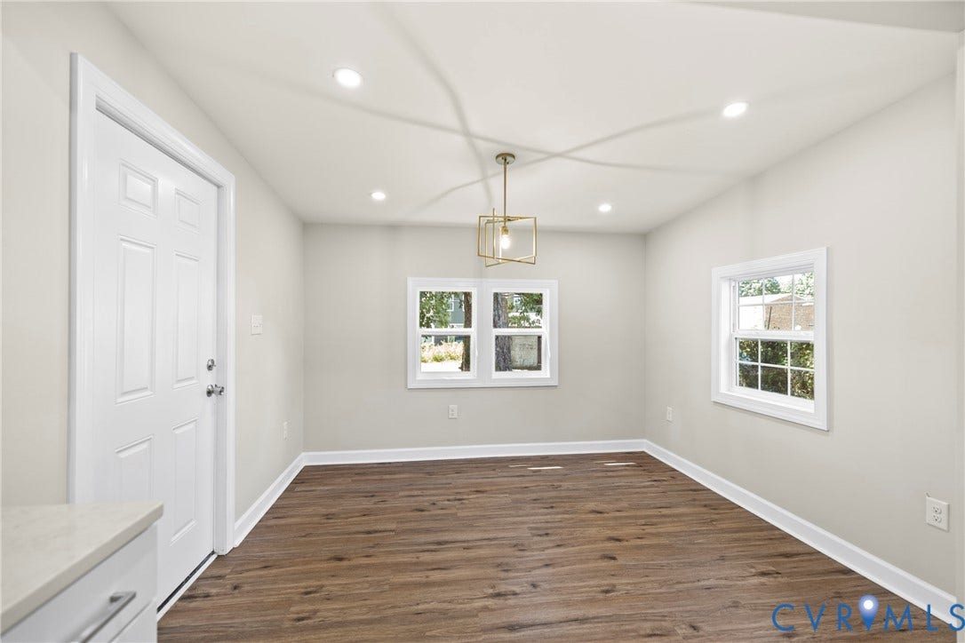 606 Effingham Drive, Woodhaven, Richmond, VA 23224 Recessed ceiling lighting, updated pendant light fixture, wood-finish flooring, white trim, and light wall tones