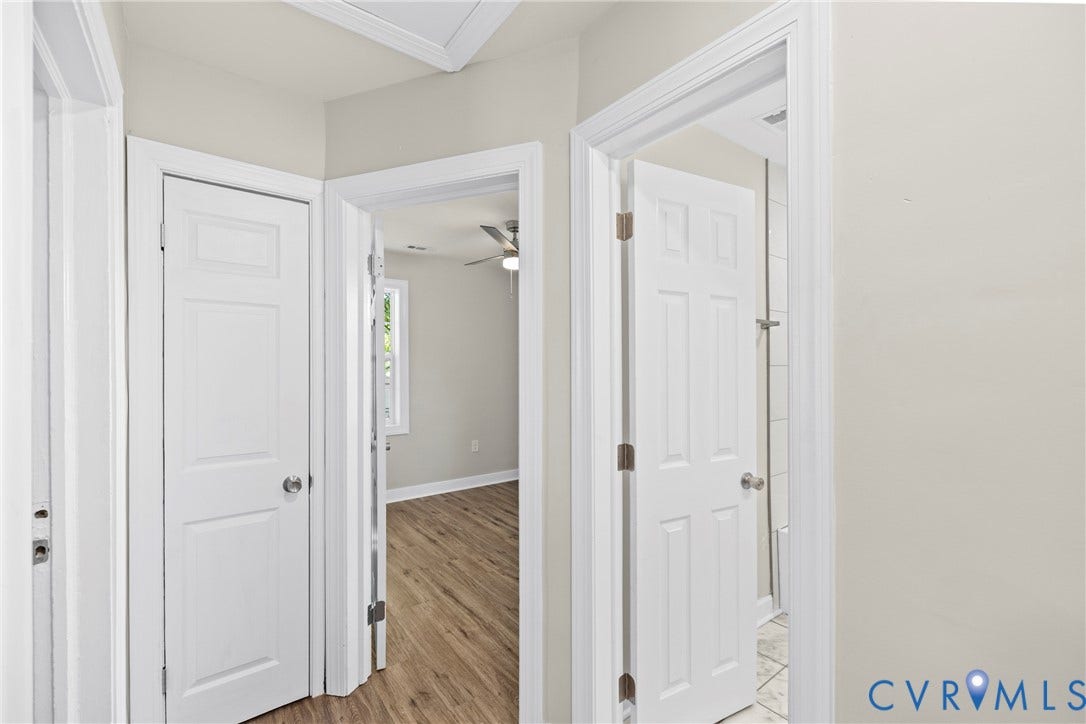 606 Effingham Drive, Woodhaven, Richmond, VA 23224 Hallway featuring wood-finish flooring and light neutral wall tones