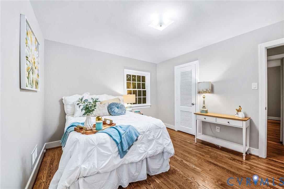 7548 Piney Branch Road, Stratford Hills, Richmond, VA 23225 Hardwood-finish flooring, recessed lighting, window with exterior landscape, and a louvered door