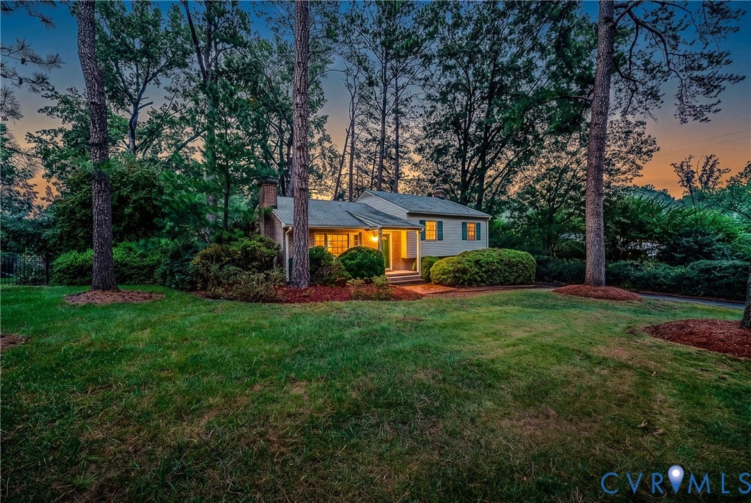 7548 Piney Branch Road, Stratford Hills, Richmond, VA 23225 Exterior featuring a brick chimney, gabled roof, and mature trees