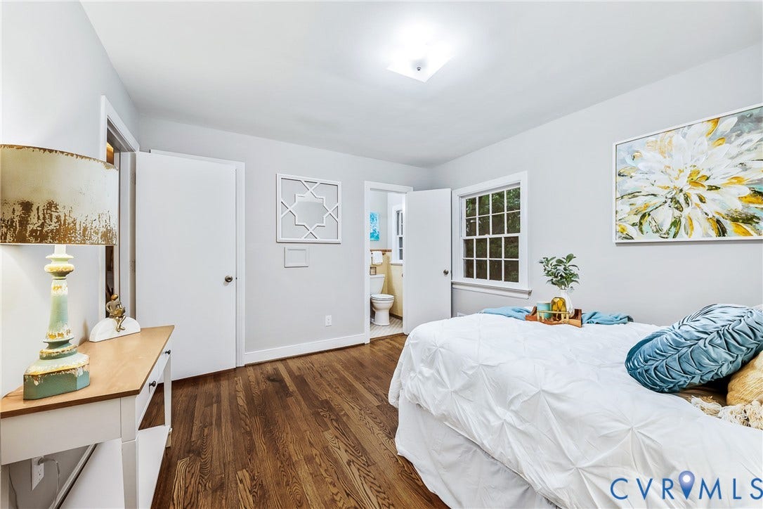7548 Piney Branch Road, Stratford Hills, Richmond, VA 23225 Hardwood flooring throughout, a square paneled window, recessed ceiling lighting, and light-toned wall finishes