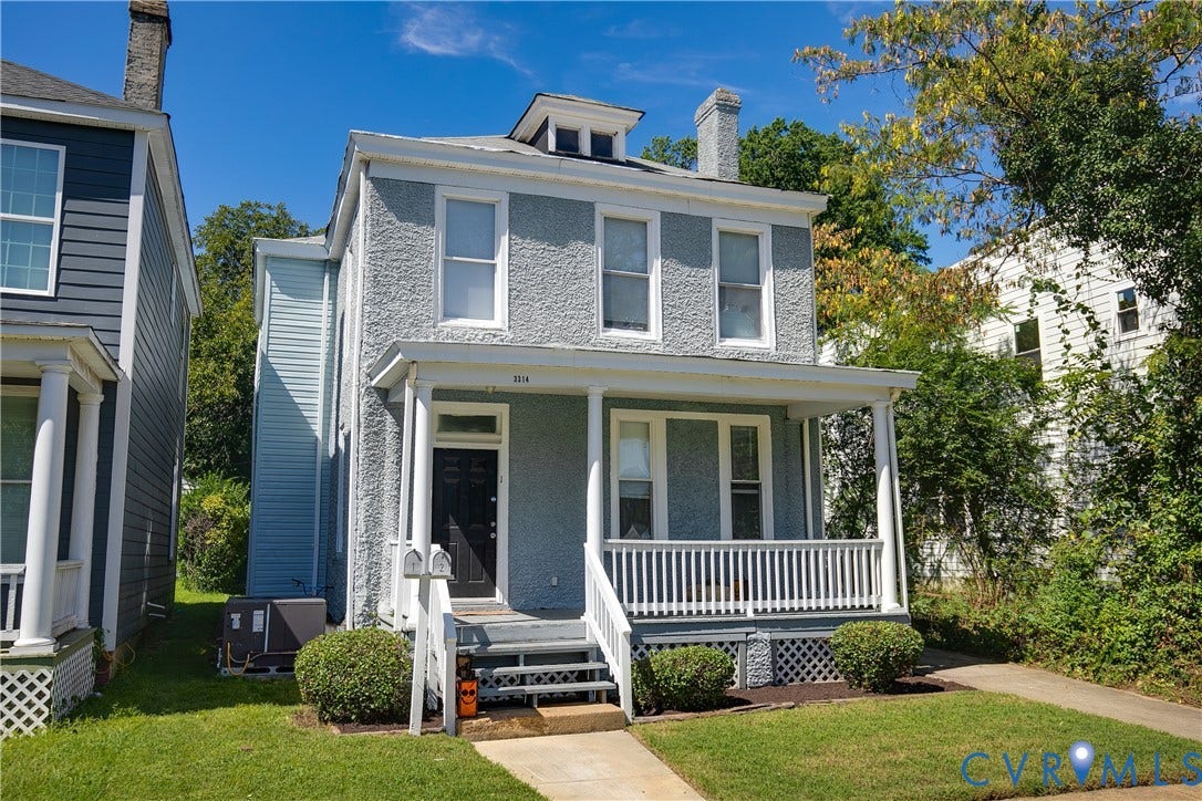 3314 3rd Avenue, Northside, Richmond, VA 23222 Two-story residence featuring a covered front porch, stucco exterior finish, and a dormer window