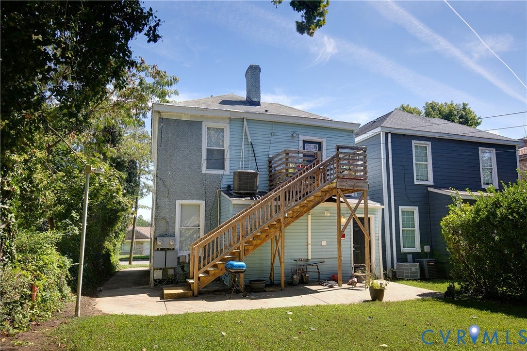 3314 3rd Avenue, Northside, Richmond, VA 23222 Rear concrete patio with wooden deck and staircase access