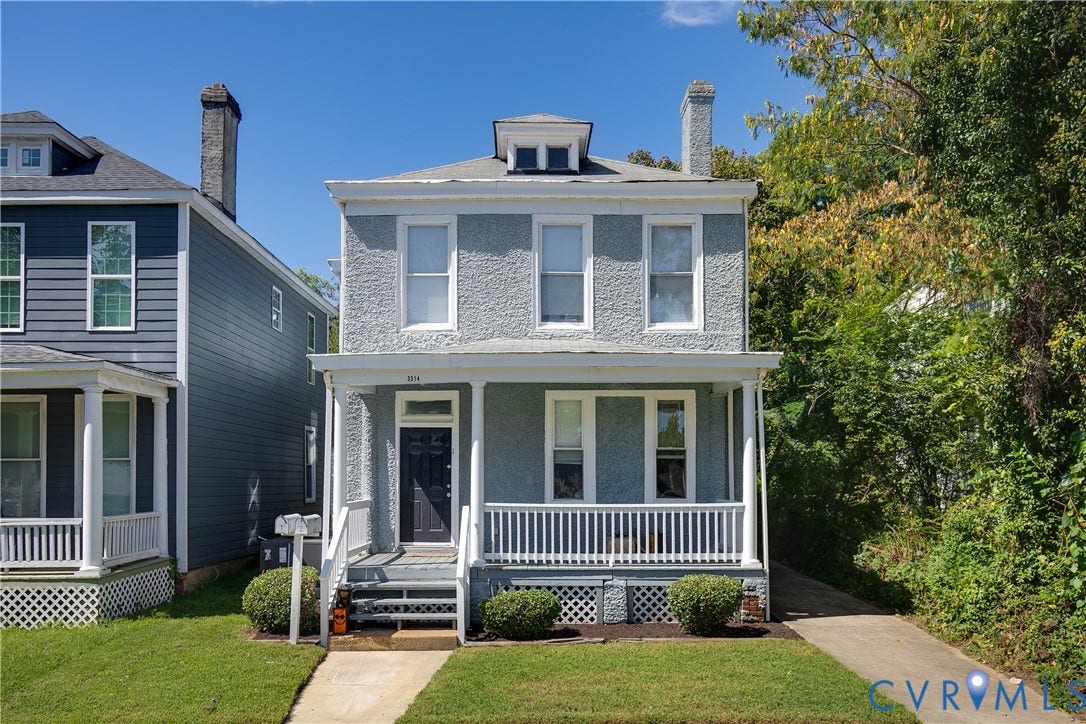 3314 3rd Avenue, Northside, Richmond, VA 23222 Stucco exterior with a covered front porch, white railing, and a gabled dormer