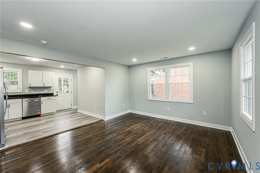 1608 Bryan Street, Richmond, VA 23223 Recessed ceiling lighting, wood-finish flooring, white cabinetry, dark countertops, and stainless steel appliances