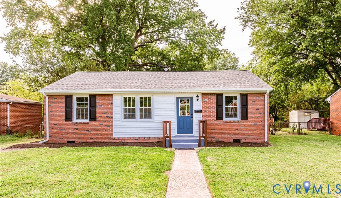 1608 Bryan Street, Richmond, VA 23223 Brick and siding exterior with a gabled roof