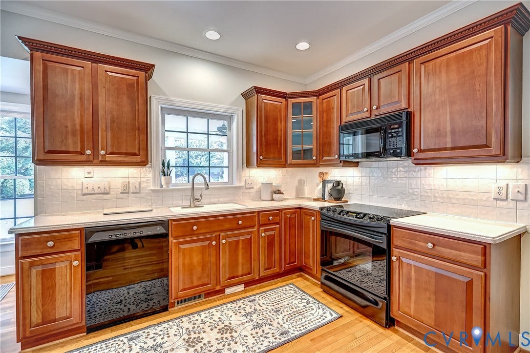 5204 Harvest Glen Drive, Twin Hickory, Glen Allen, VA 23059 Kitchen featuring warm wood cabinetry, neutral countertops, white tile backsplash, and recessed lighting