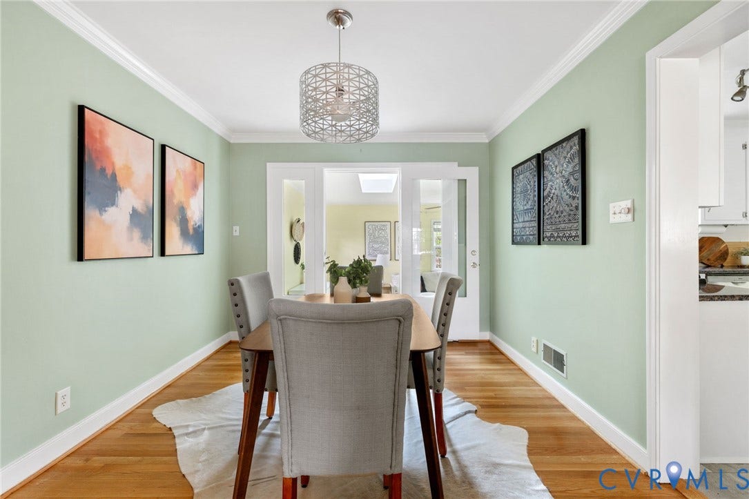 Hardwood flooring, crown molding, modern ceiling fixture, recessed lighting, and white trim