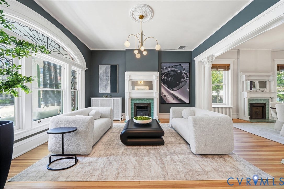 1848 W Grace Street, Historic W. Grace Street, Richmond, VA 23220 Hardwood flooring, decorative ceiling medallion, arched window with decorative glass, decorative mantelpiece, and a chandelier