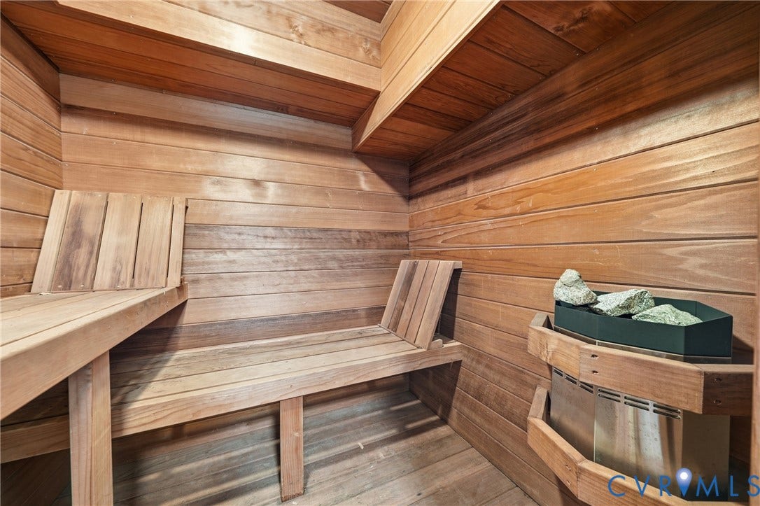 1848 W Grace Street, Historic W. Grace Street, Richmond, VA 23220 Built-in sauna featuring wood-paneled walls, a wood-finish ceiling, and integrated wooden benches