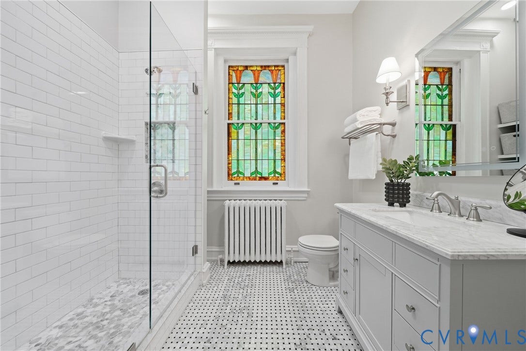 1848 W Grace Street, Historic W. Grace Street, Richmond, VA 23220 Walk-in shower with subway tile surround and pebble-finish floor
