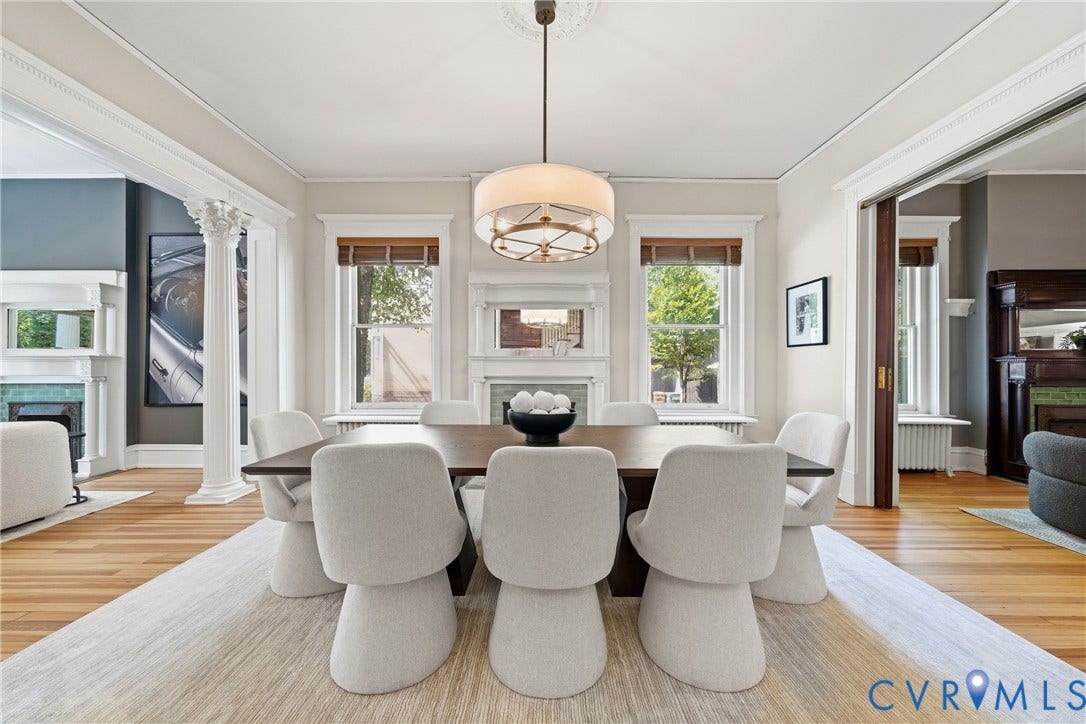 1848 W Grace Street, Historic W. Grace Street, Richmond, VA 23220 Hardwood flooring throughout, elegant decorative column, detailed crown molding, built-in pocket doors, and a decorative ceiling medallion