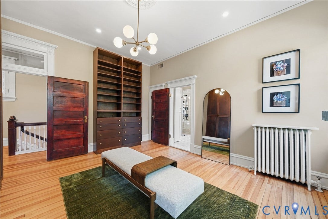 1848 W Grace Street, Historic W. Grace Street, Richmond, VA 23220 Built-in shelving with integrated drawers, wood-finish flooring, and a modern ceiling fixture