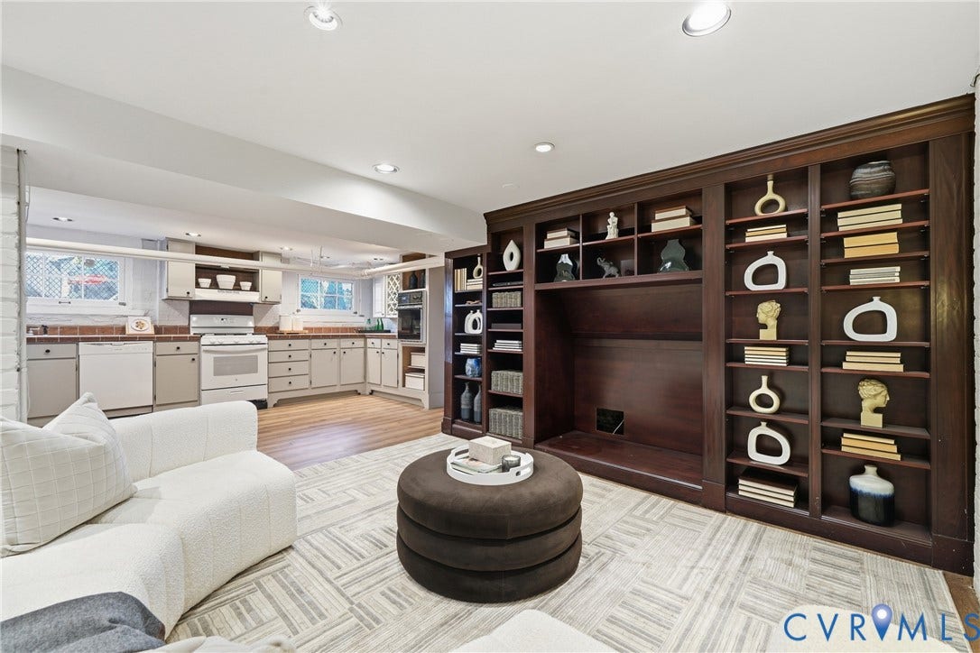 1848 W Grace Street, Historic W. Grace Street, Richmond, VA 23220 Built-in dark wood shelving and media center with recessed lighting