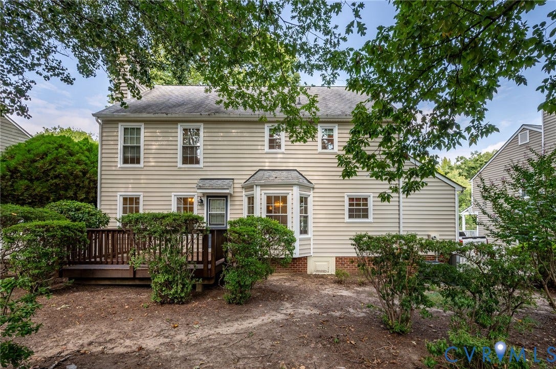 3005 Wiltonshire Drive, Richmond, VA 23233 Rear exterior with beige siding, a bay window, and a wood deck