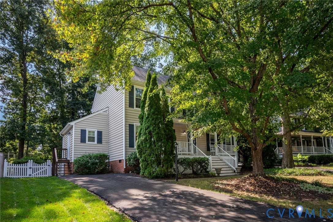 3005 Wiltonshire Drive, Richmond, VA 23233 Expansive driveway leading to a two-story residence with siding exterior