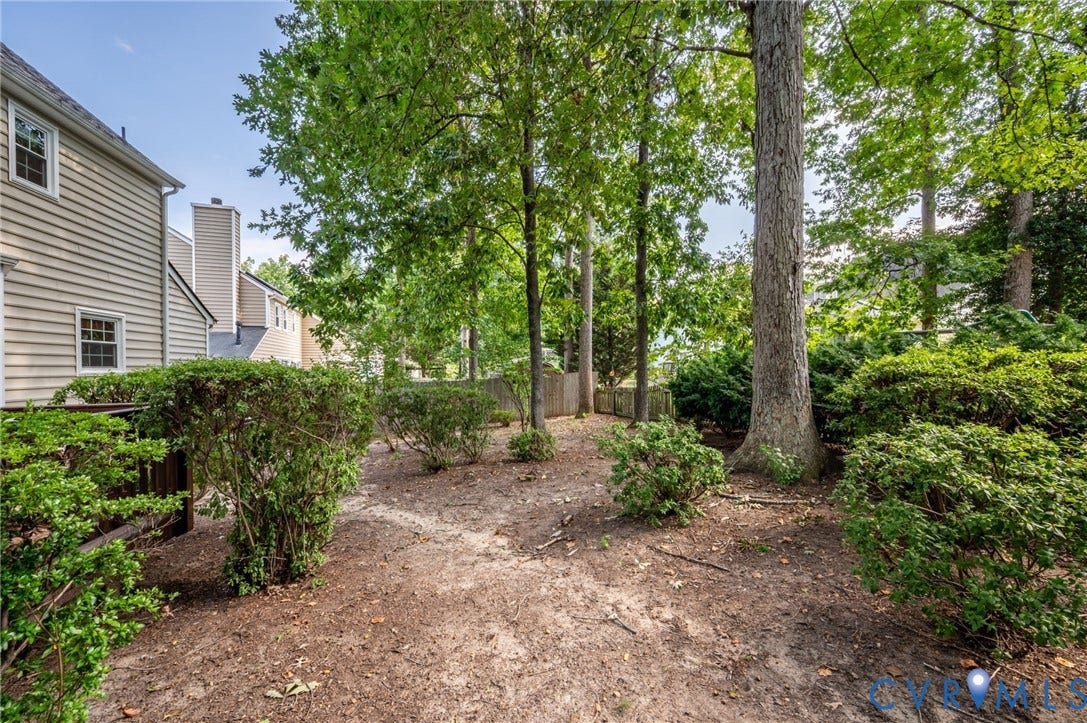 3005 Wiltonshire Drive, Richmond, VA 23233 Mature trees and established shrubs enhance the natural setting