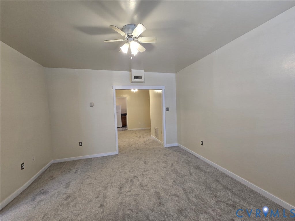 114 S Addison Street, #Lower, Richmond, VA 23220 Living room with new carpet, opens to dining room