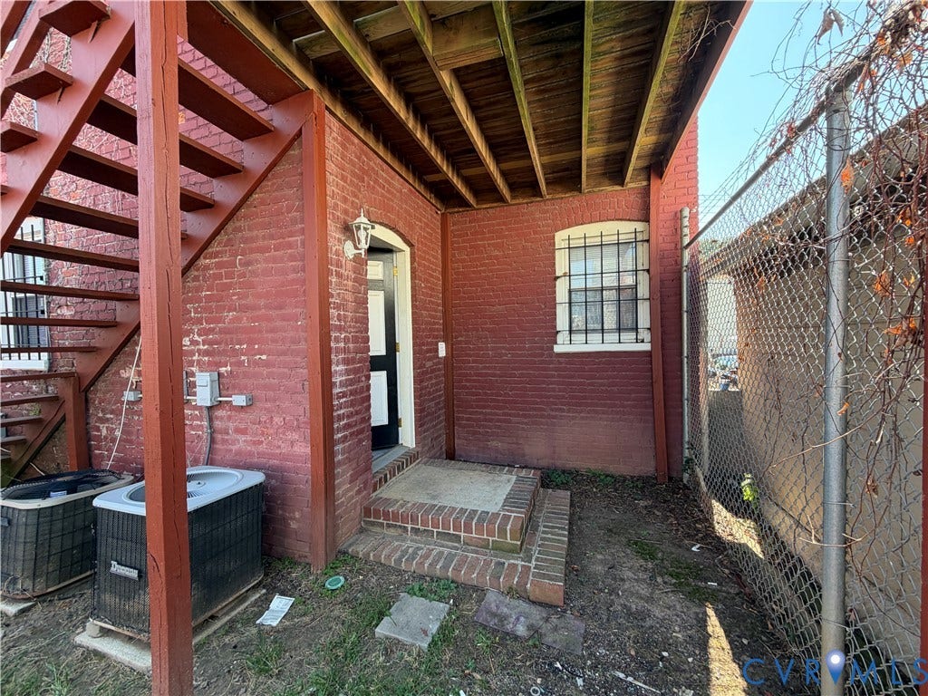 114 S Addison Street, #Lower, Richmond, VA 23220 Back door and stoop, with room for patio furniture on grass