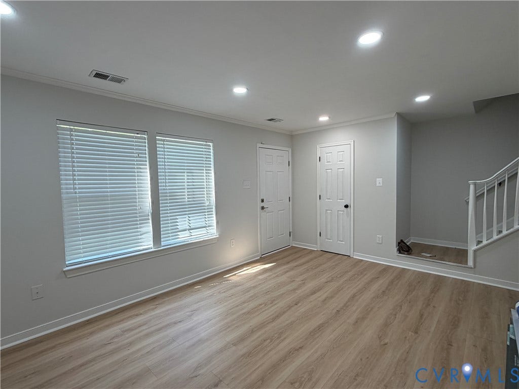 1838 Timberly Waye, Henrico, VA 23238 Large living room with powder room and new LVP flooring!