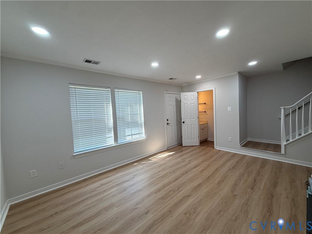 1838 Timberly Waye, Henrico, VA 23238 Large living room with powder room and new LVP flooring!