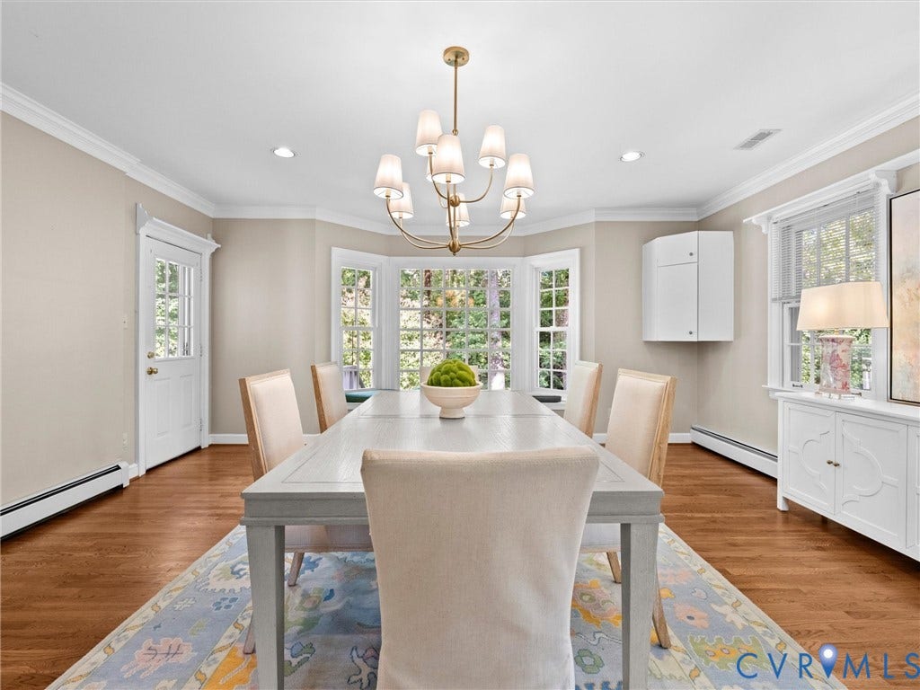216 Ross Road, Westham Area, Henrico, VA 23229 Hardwood flooring, bay window, crown molding, recessed lighting, and a chandelier