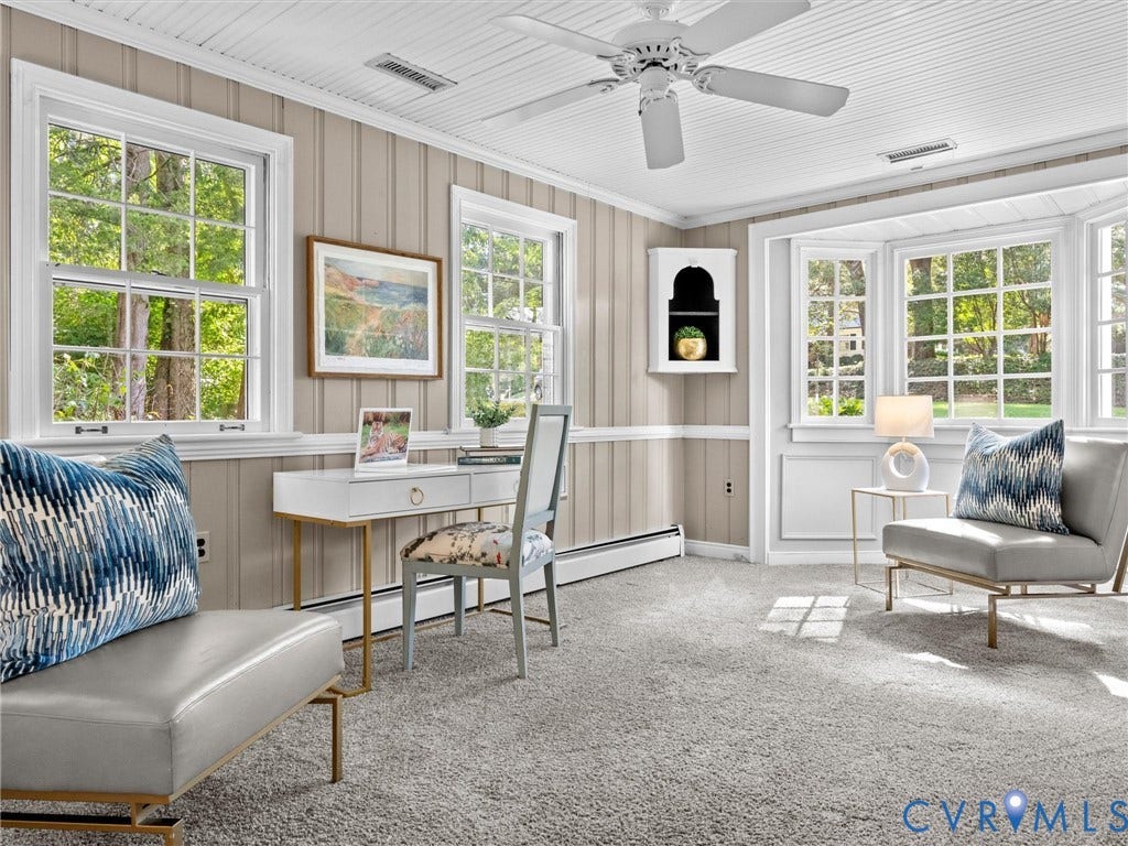 216 Ross Road, Westham Area, Henrico, VA 23229 Carpeted room with beadboard wainscoting and a multi-pane bay window