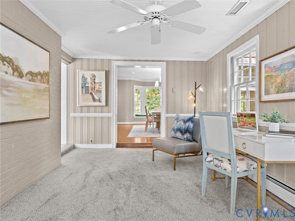 216 Ross Road, Westham Area, Henrico, VA 23229 Wall paneling and trim accents, ceiling fan fixture, carpeted flooring, and a window with natural light