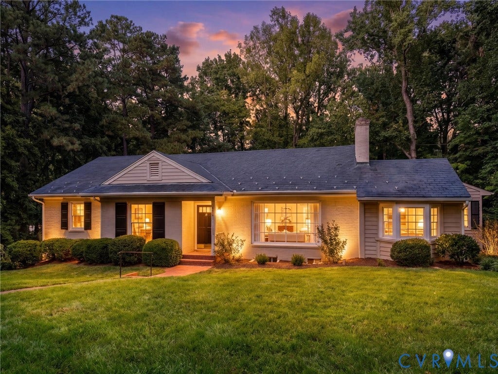 216 Ross Road, Westham Area, Henrico, VA 23229 Stucco exterior with a dark shingle roof, featuring a bay window and brick chimney