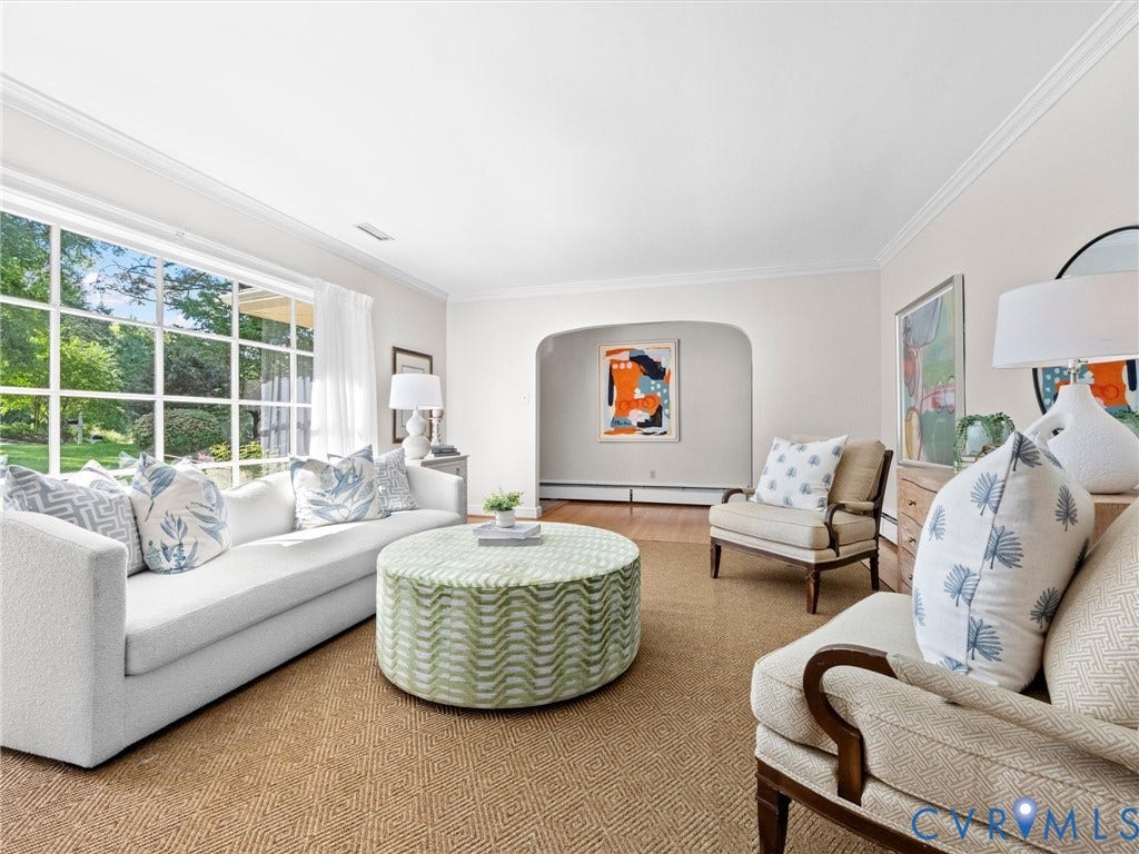 216 Ross Road, Westham Area, Henrico, VA 23229 Hardwood flooring, crown molding, large divided light windows, arched doorway, and light-toned walls